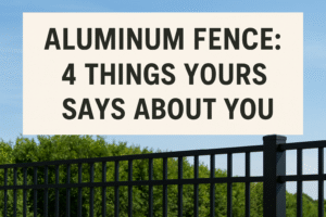 Modern black aluminum fence in front of a green yard with bold blog title text: Aluminum Fence – 4 Things Yours Says About You.