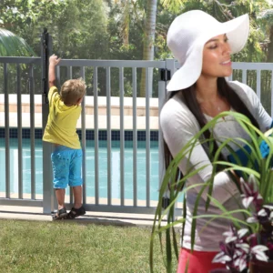 Child attempts to enter a swimming pool is blocked by a BOCA swimming Pool compliant child safety magna latch gate lock