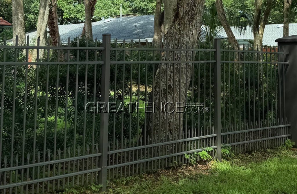 Bronze residential aluminum fence with spear top puppy pickets