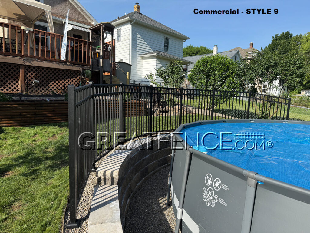 Black aluminum pool fence with angles and aluminum post welded plate, plate covers