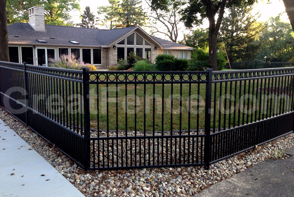 aluminum fence with rings and puppy pickets installed at a 45 degree angle